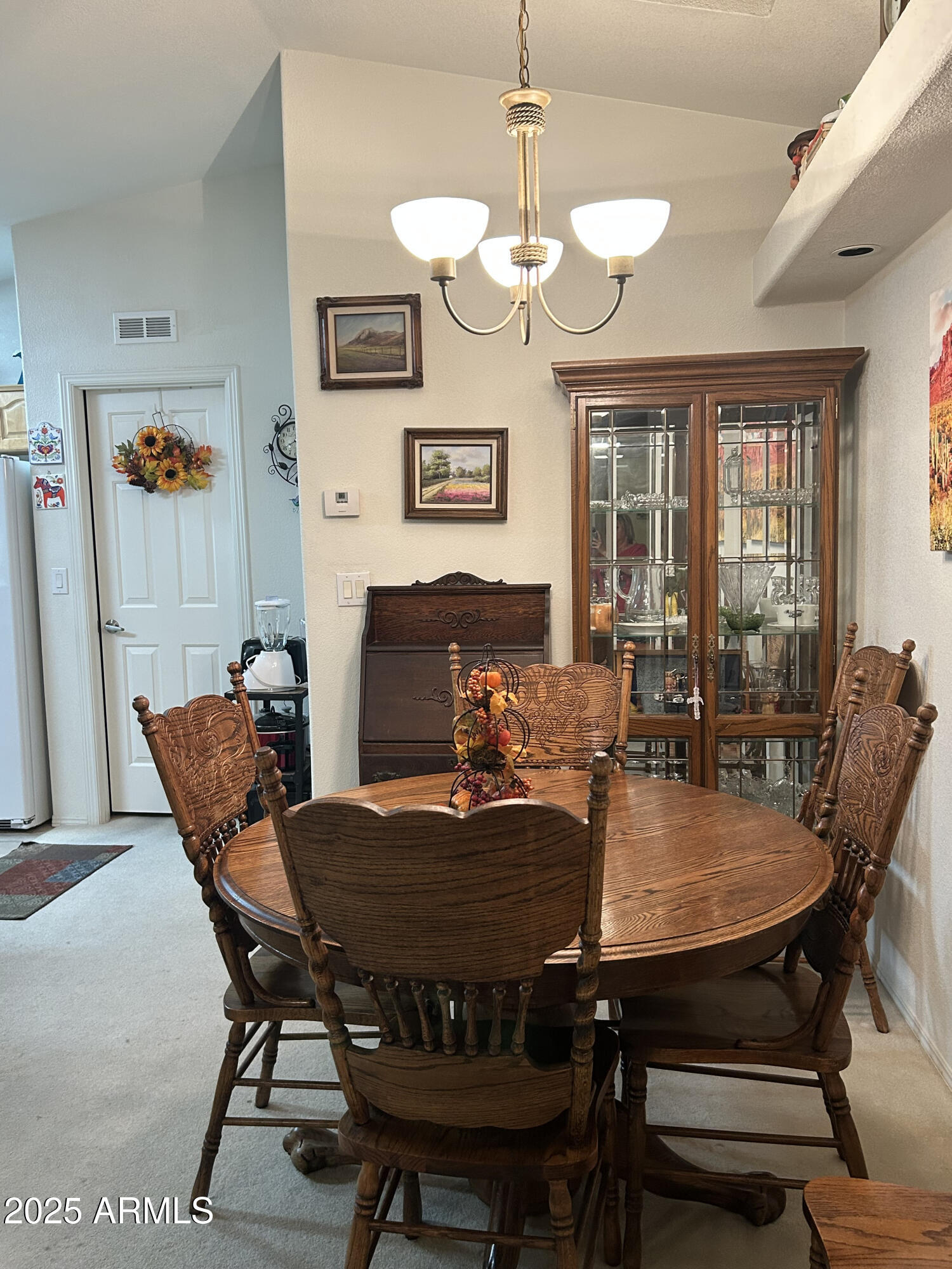 3301 South Goldfield Road, Unit 3011 Apache Junction, AZ 85119 - Photo 46 of 65 a view of a dining room with furniture