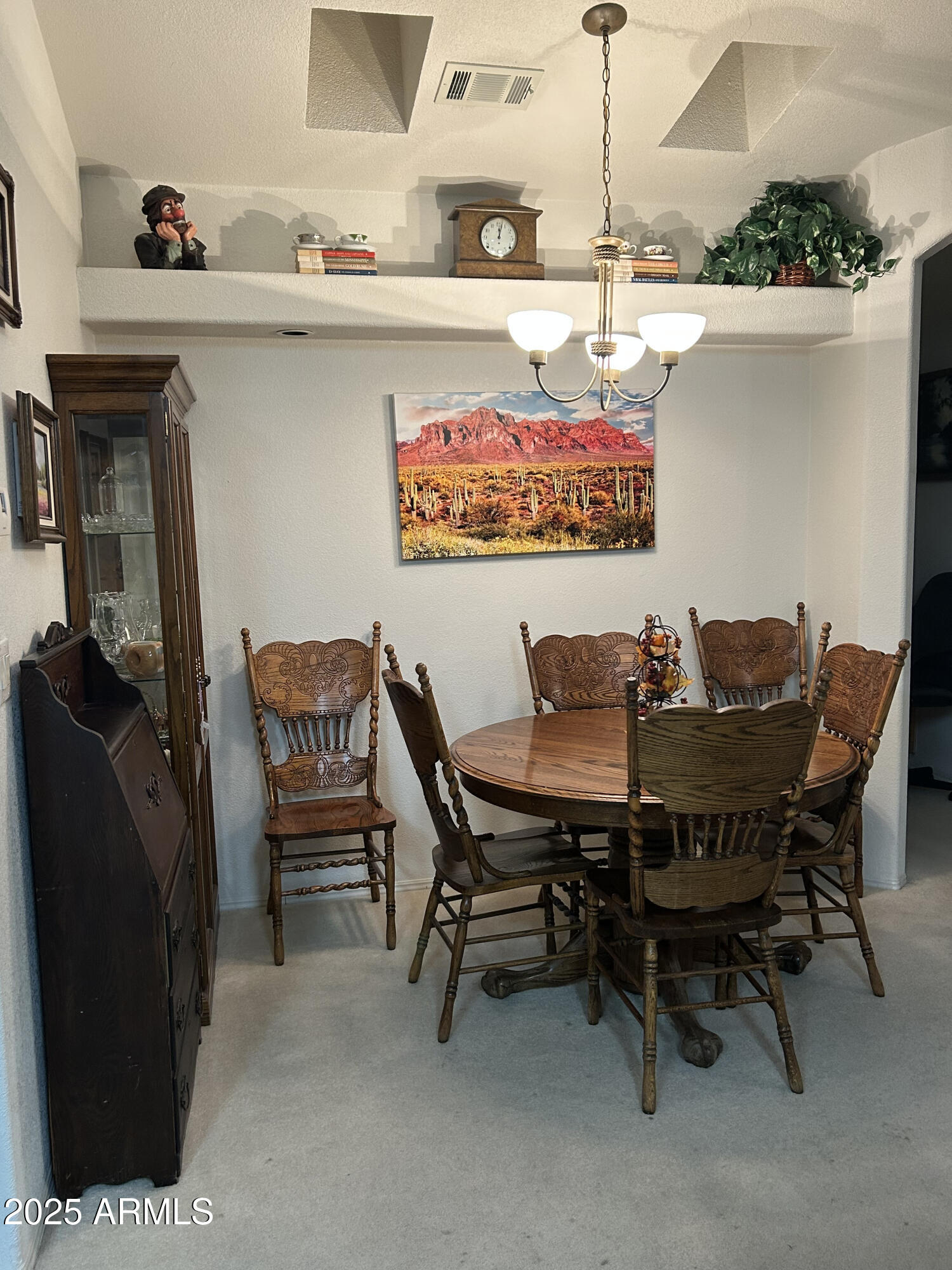 3301 South Goldfield Road, Unit 3011 Apache Junction, AZ 85119 - Photo 47 of 65 a view of a dining room with furniture