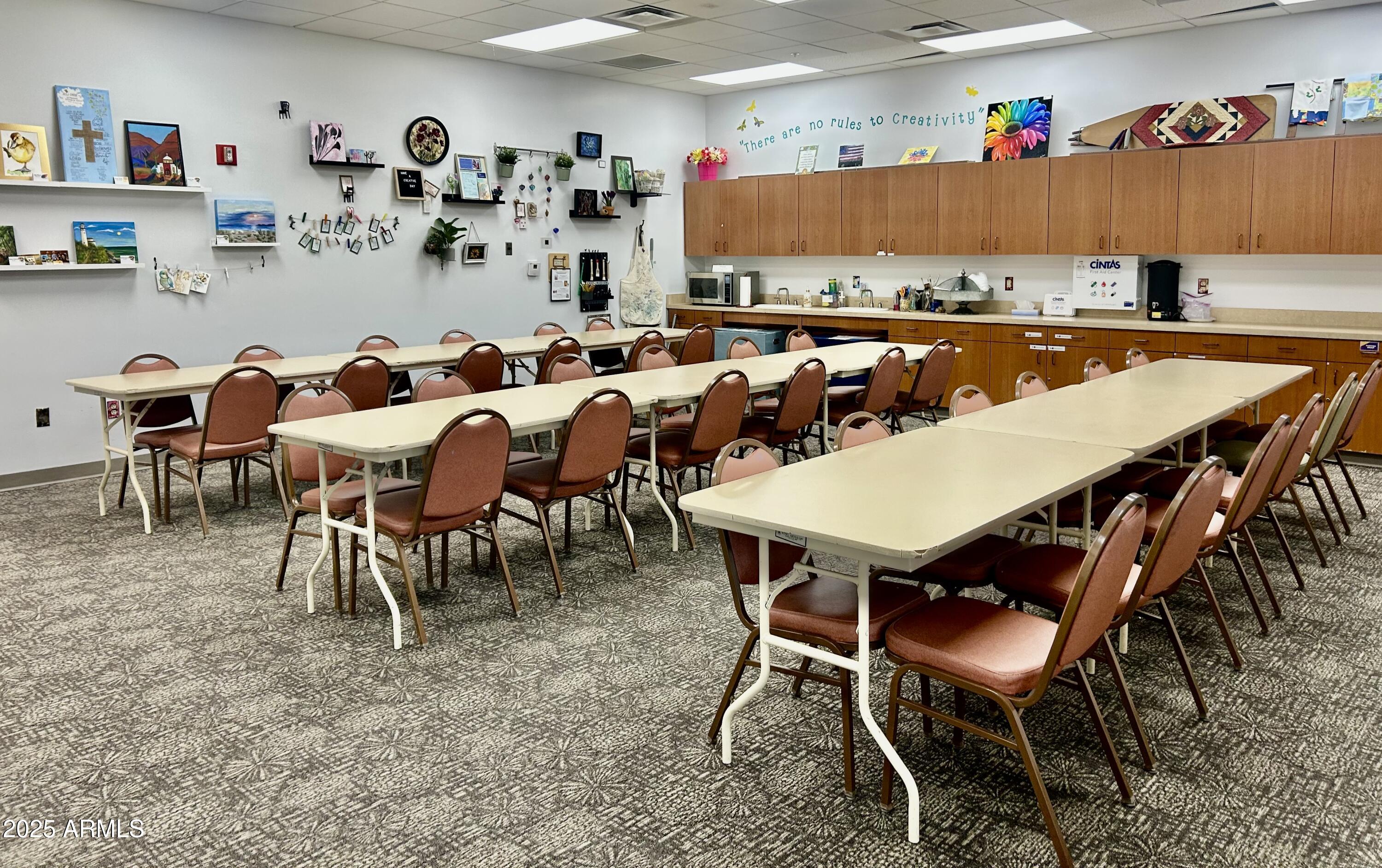 3301 South Goldfield Road, Unit 3011 Apache Junction, AZ 85119 - Photo 54 of 65 a view of a dining area with furniture