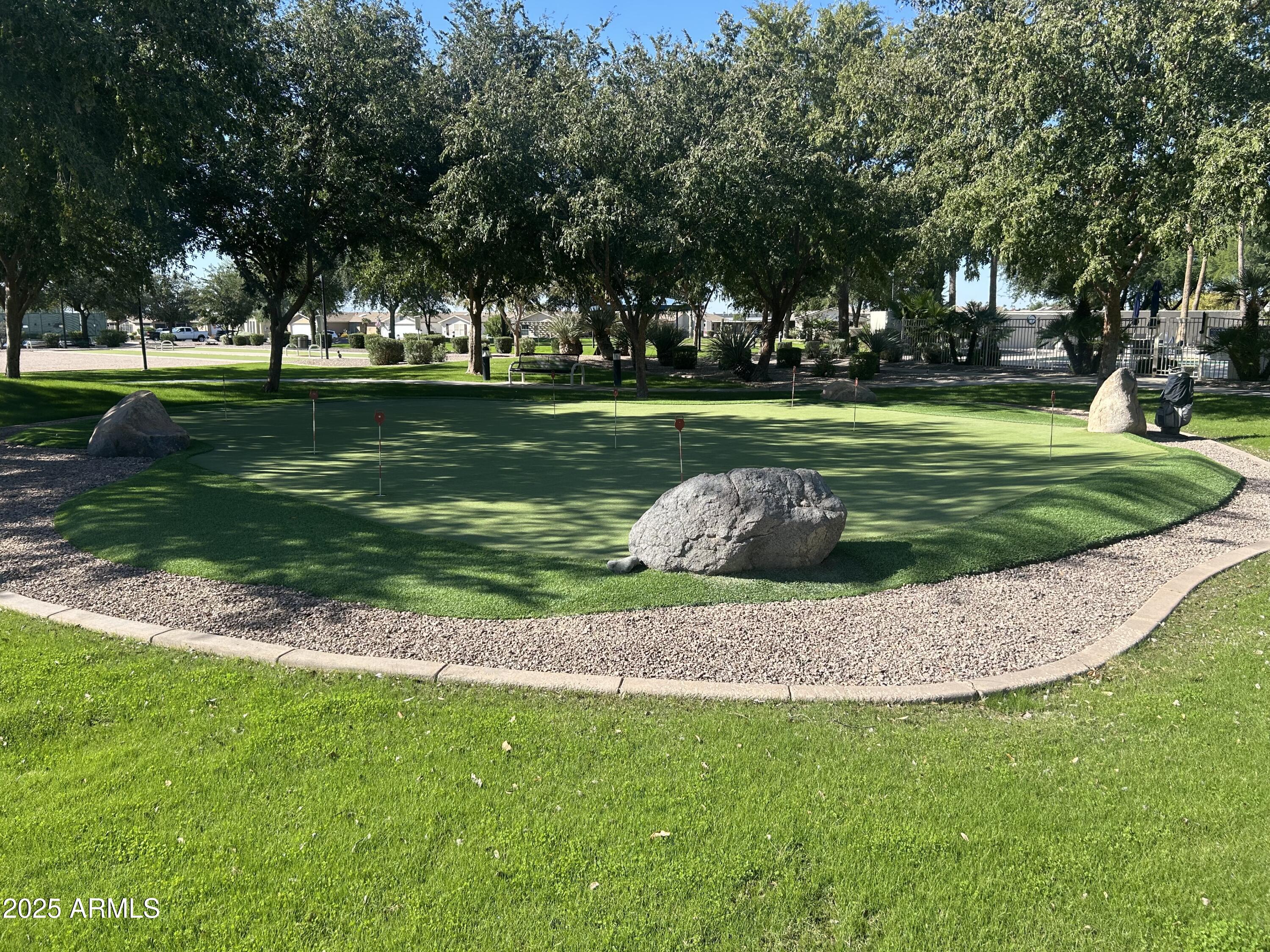 3301 South Goldfield Road, Unit 3011 Apache Junction, AZ 85119 - Photo 58 of 65 a view of a park with tree s
