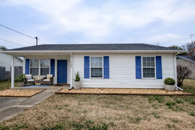 front view of a house with a patio