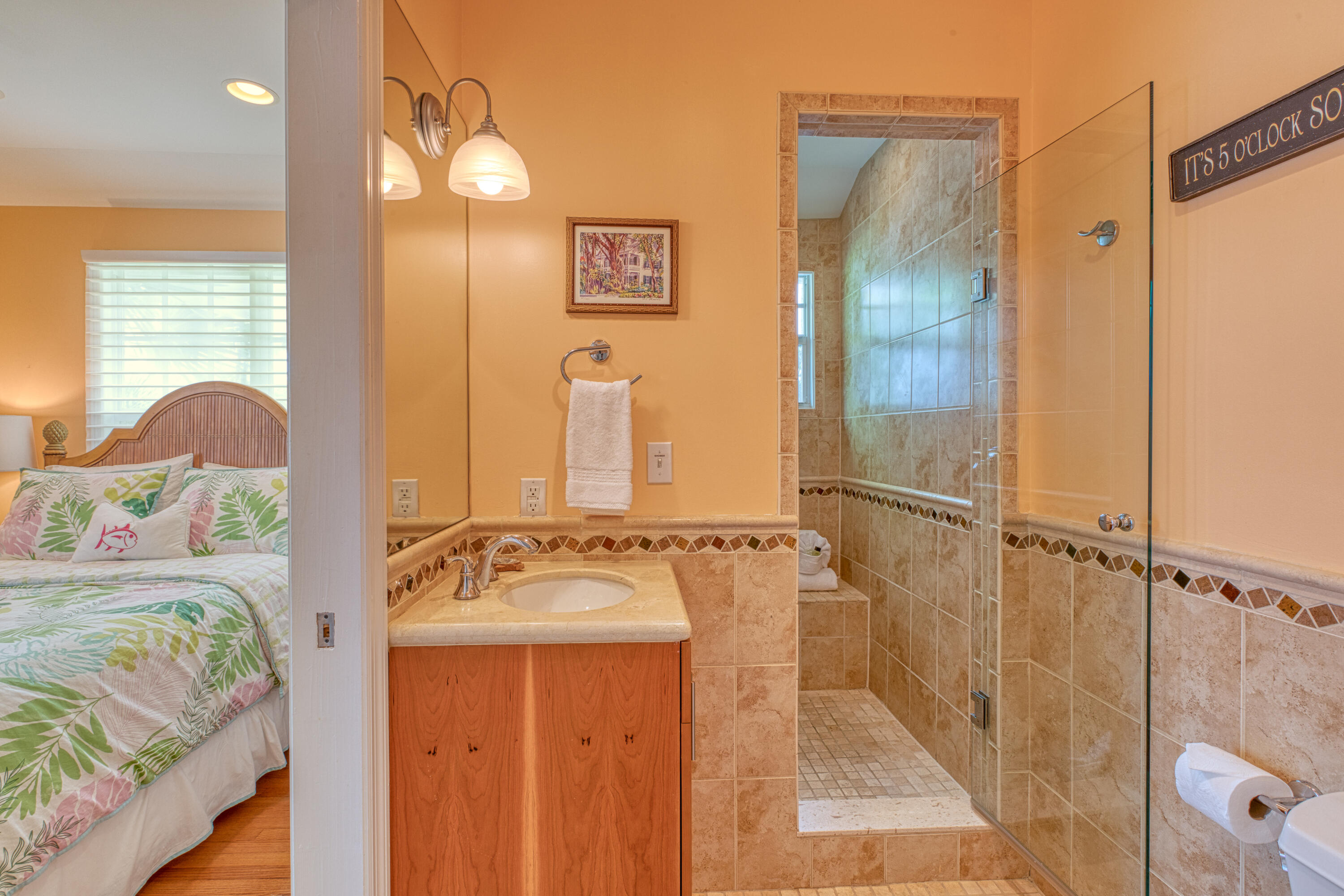 506 Emma Street Key West, FL 33040 - Photo 12 of 24 a bathroom with a tub a sink and a mirror