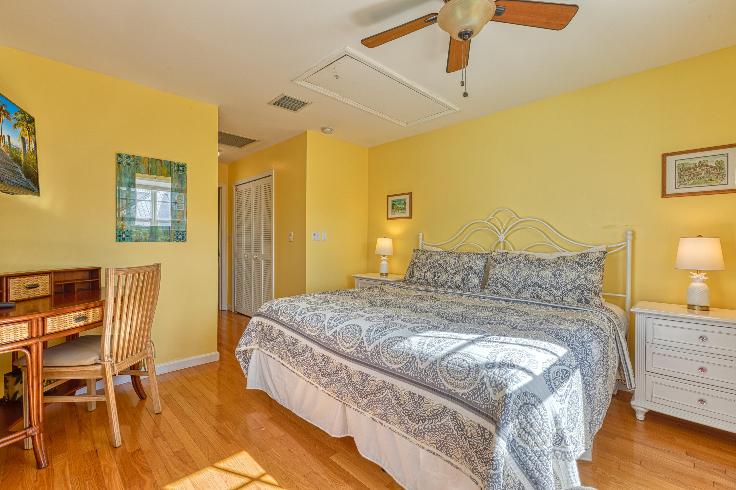 506 Emma Street Key West, FL 33040 - Photo 14 of 24 a bedroom with a bed and furniture