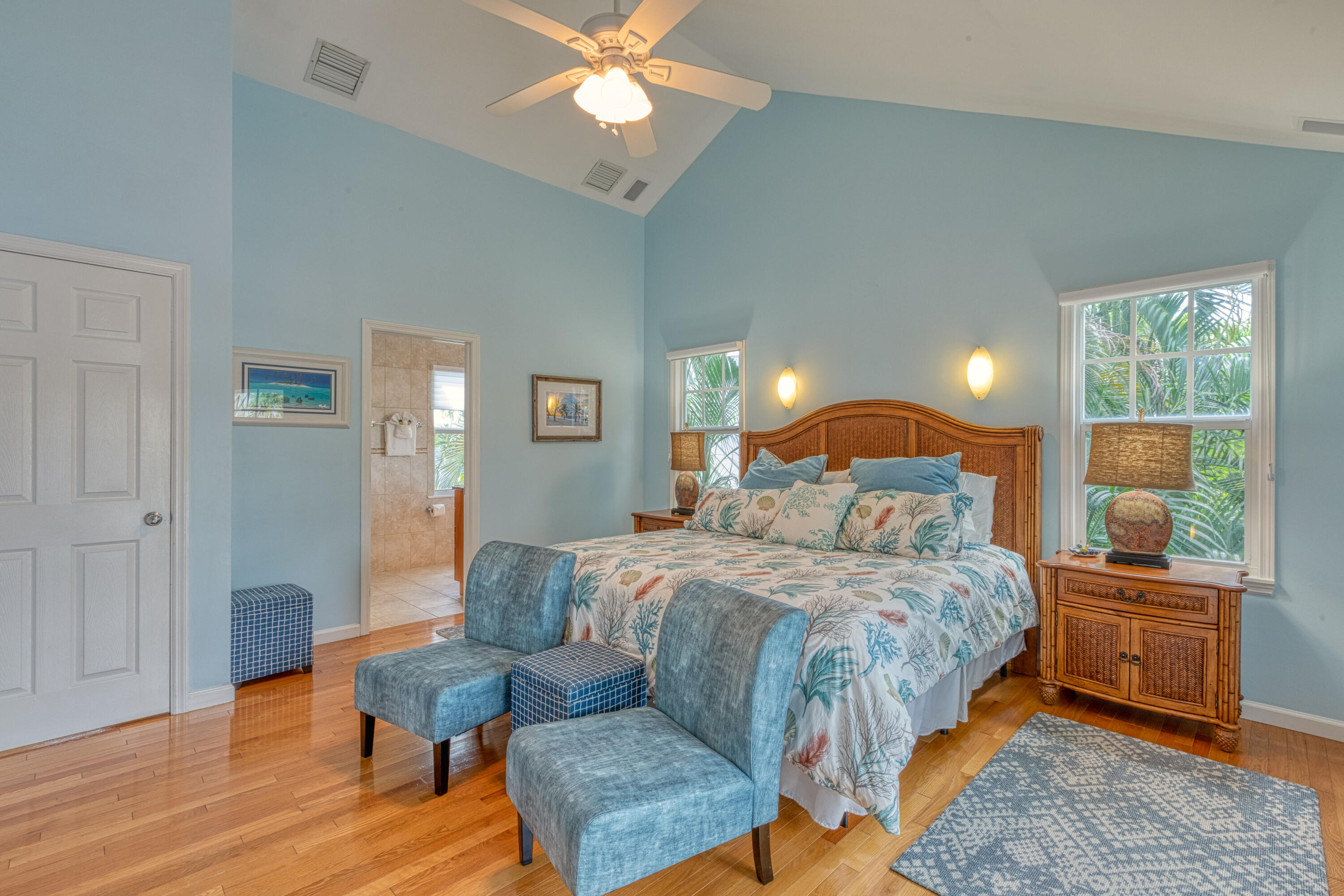 506 Emma Street Key West, FL 33040 - Photo 17 of 24 a bedroom with a bed and wooden floor