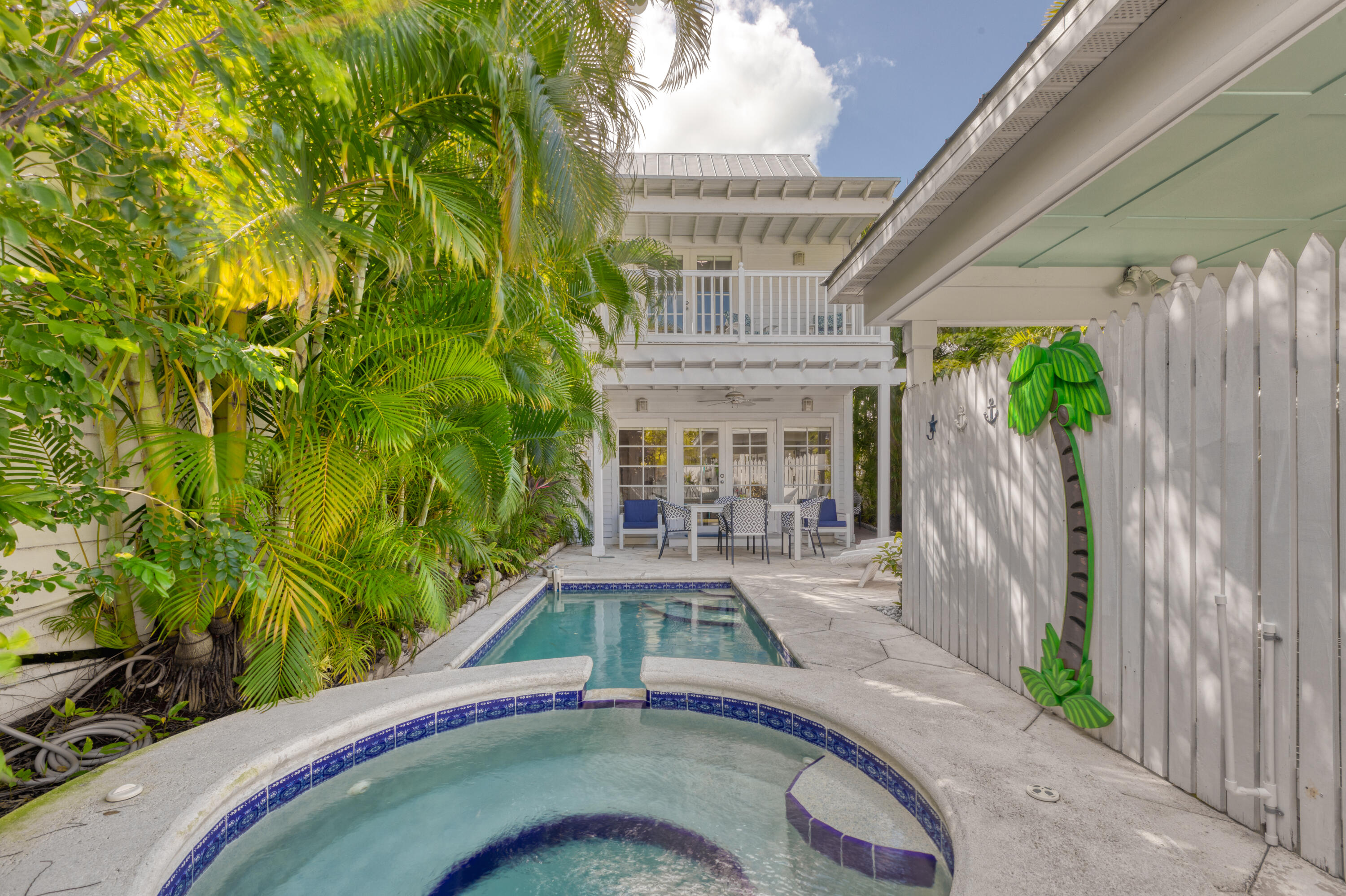 506 Emma Street Key West, FL 33040 - Photo 23 of 24 a front view of a house with a yard