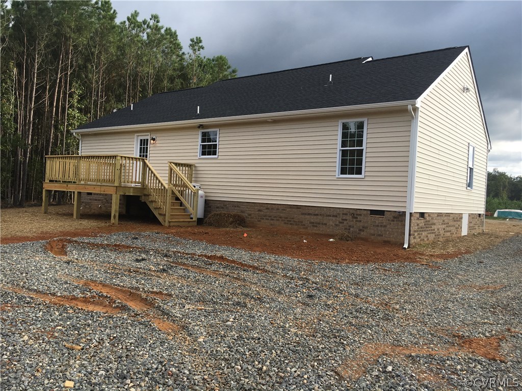 1330 Lewis Level Road Tappahannock, VA 22560 - Photo 2 of 10 Rear wood deck to add that outdoor living space!