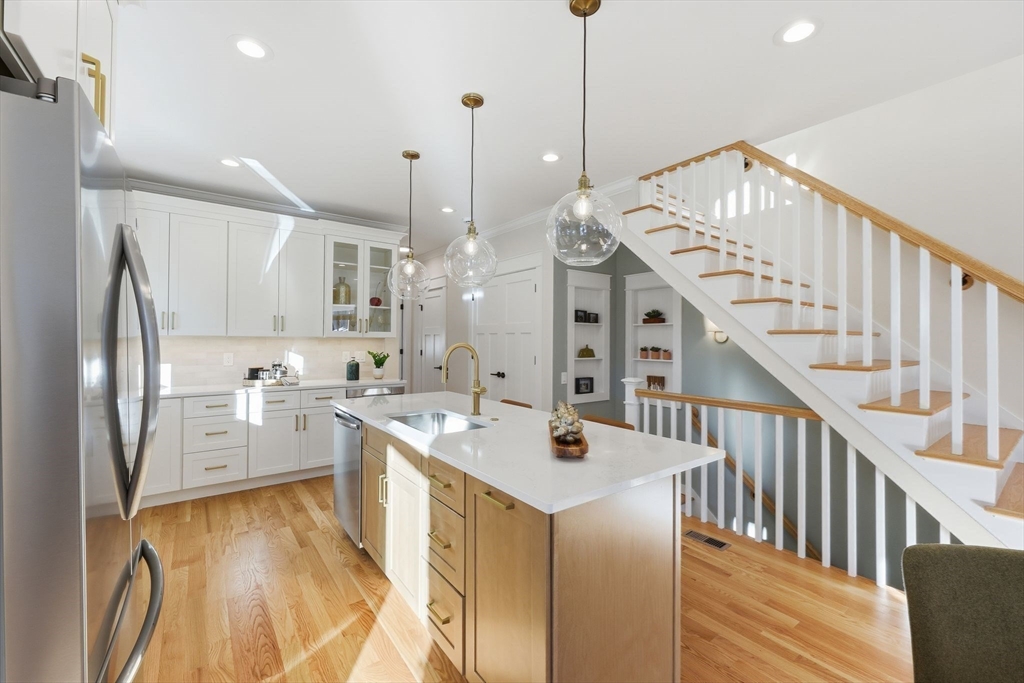 37 Landy Avenue Northampton, MA 01062 - Photo 11 of 40 a kitchen with stainless steel appliances kitchen island granite countertop a sink a refrigerator and a stove