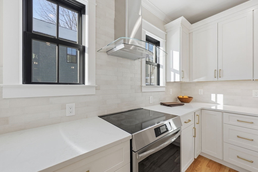 37 Landy Avenue Northampton, MA 01062 - Photo 15 of 40 a kitchen with stainless steel appliances granite countertop a sink stove and cabinets