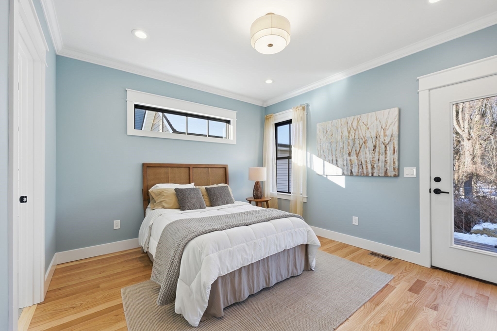 37 Landy Avenue Northampton, MA 01062 - Photo 19 of 40 a bedroom with a large bed and a painting on the wall