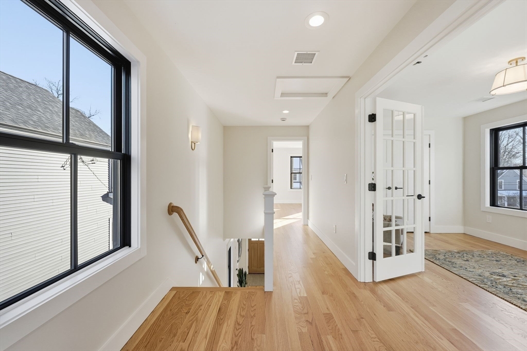 37 Landy Avenue Northampton, MA 01062 - Photo 25 of 40 a view of a hallway with wooden floor and staircase
