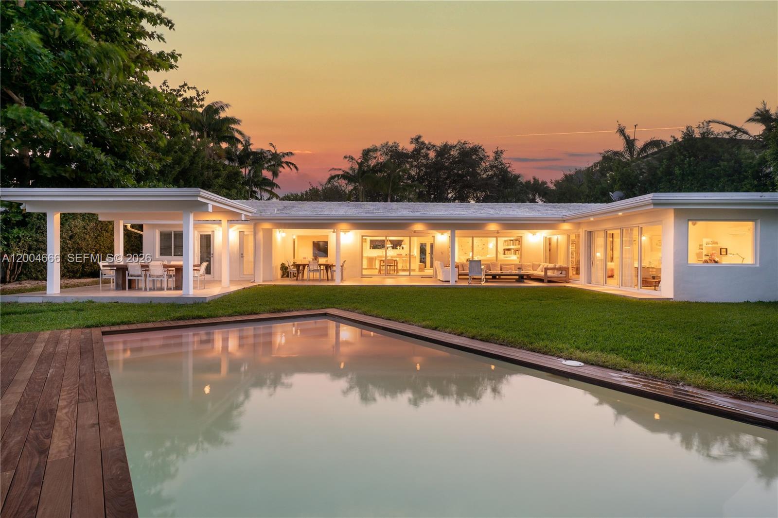 861 Harbor Drive Key Biscayne, FL 33149 - Photo 15 of 33 a view of swimming pool with a yard