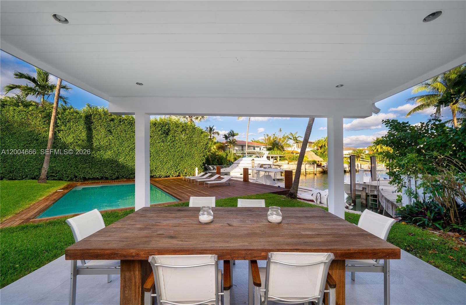 861 Harbor Drive Key Biscayne, FL 33149 - Photo 16 of 33 a view of a dining room with furniture window and outside view