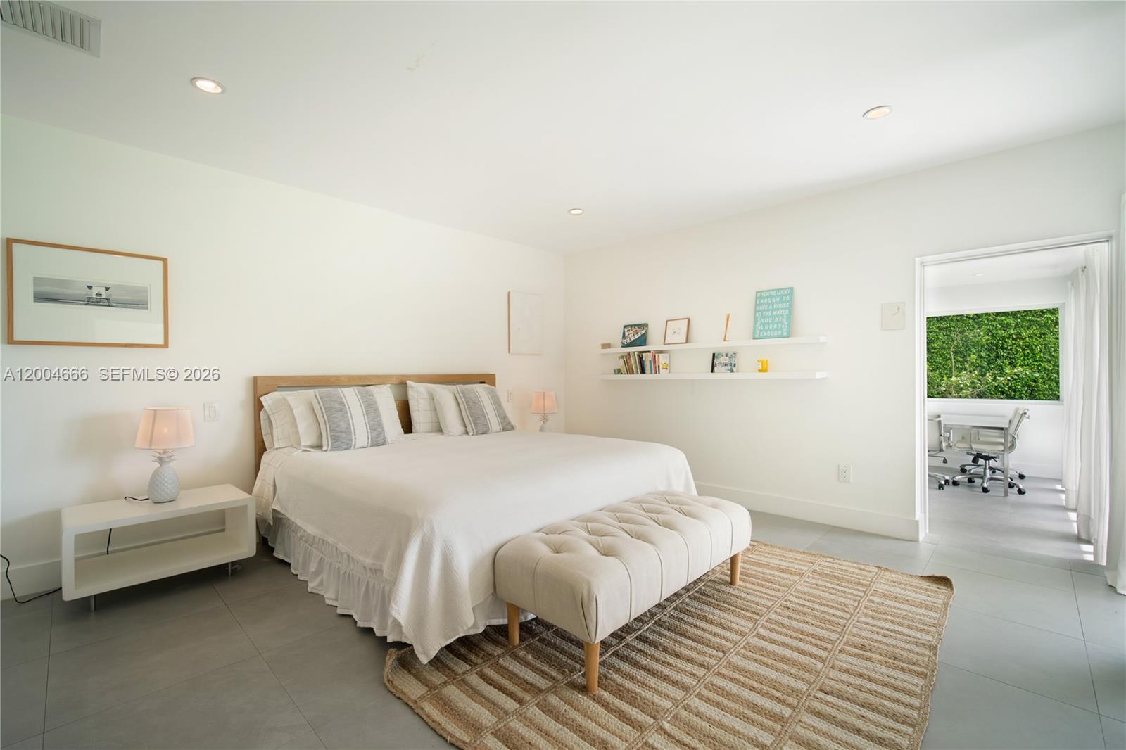 861 Harbor Drive Key Biscayne, FL 33149 - Photo 22 of 33 a bedroom with a bed and a couch