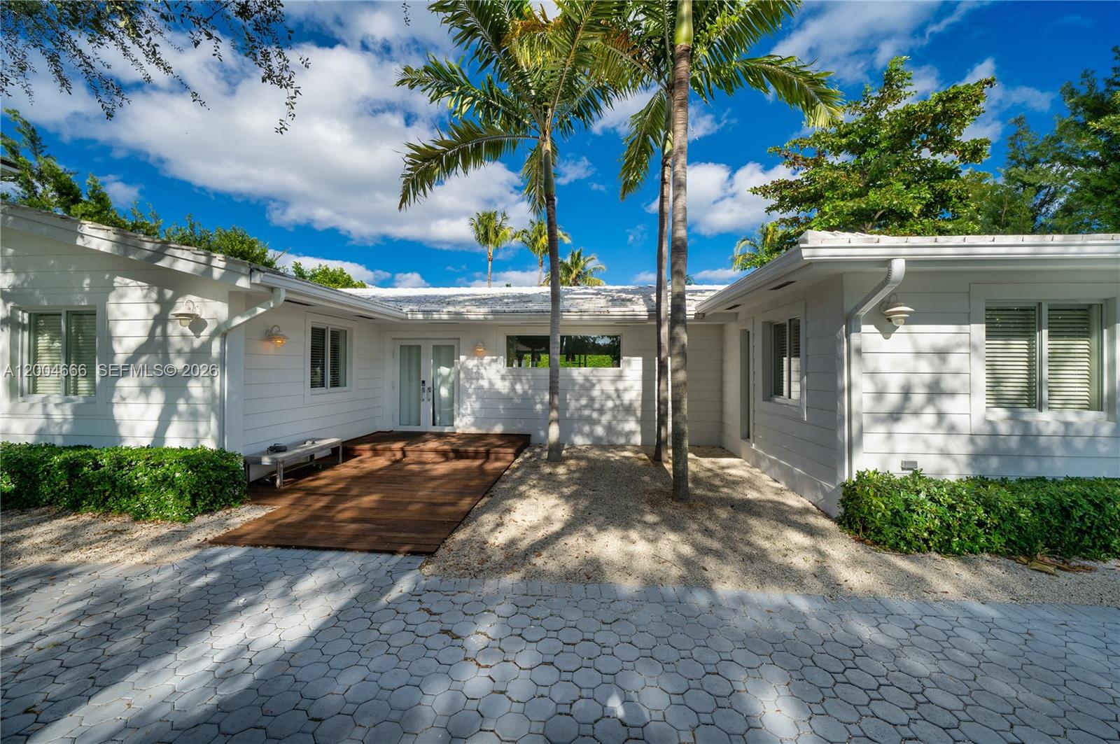 861 Harbor Drive Key Biscayne, FL 33149 - Photo 32 of 33 a view of a house with a patio