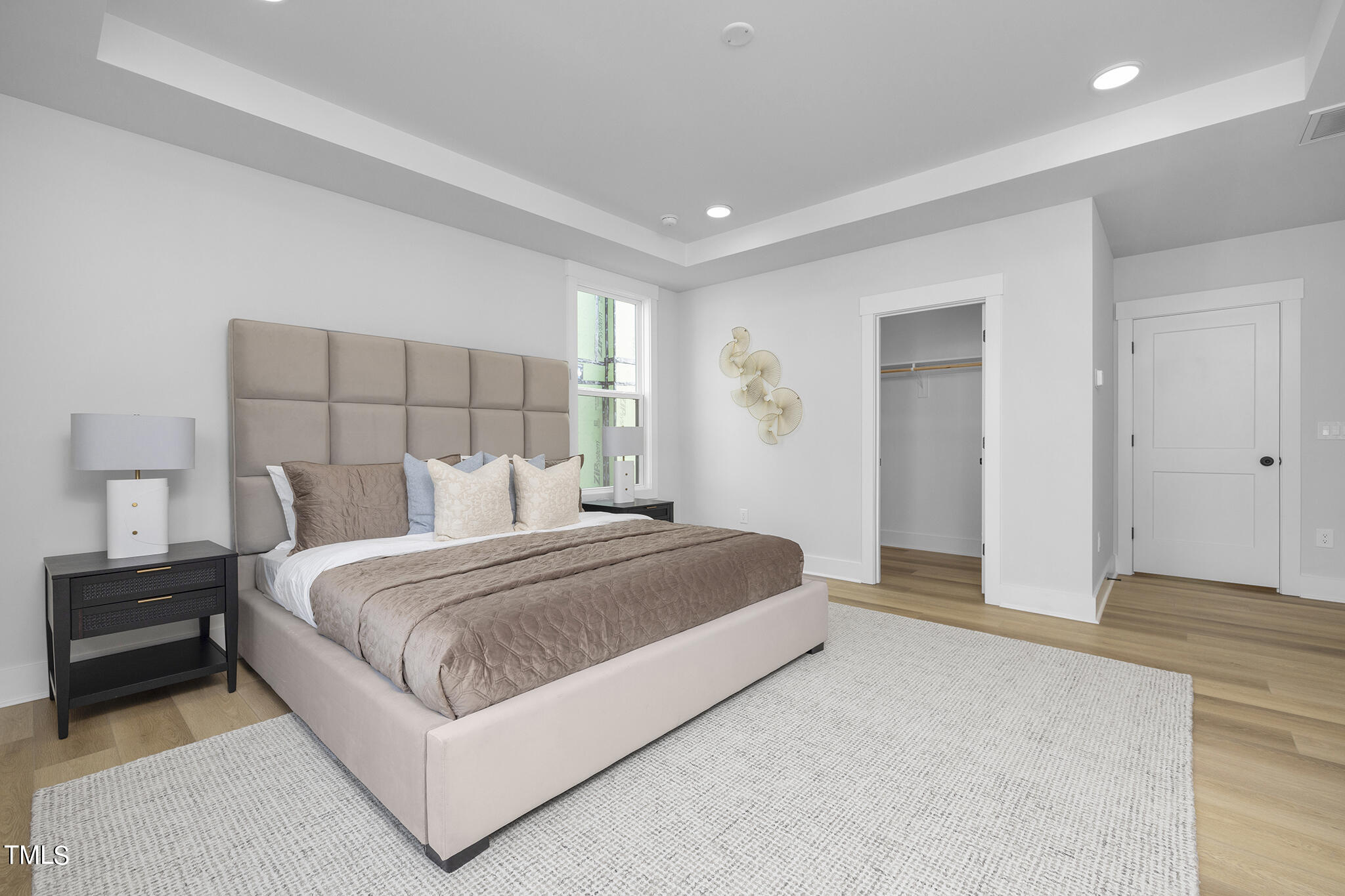 811 Fireship Road Fuquay-Varina, NC 27526 - Photo 19 of 35 a bedroom with a bed and a night stand