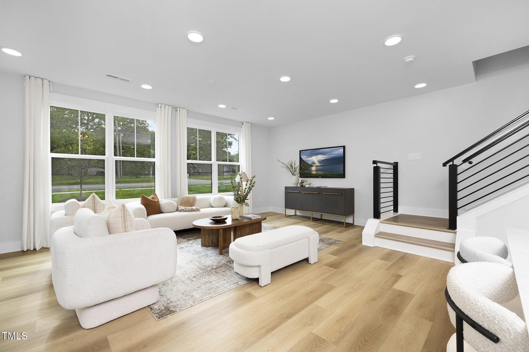 811 Fireship Road Fuquay-Varina, NC 27526 - Photo 4 of 35 a living room with furniture and a large window