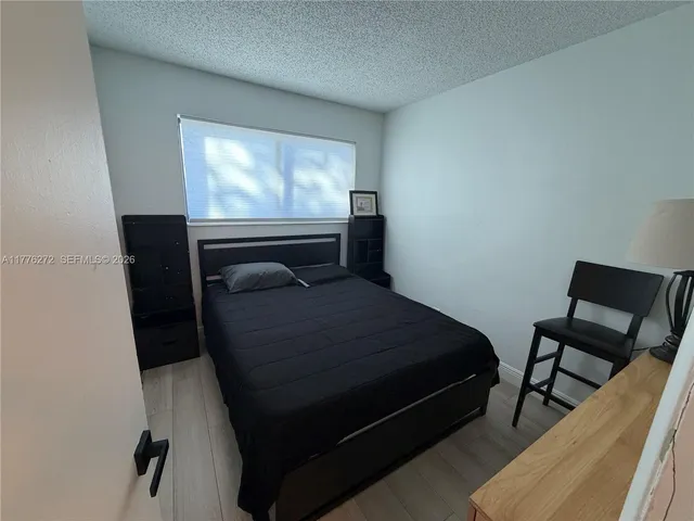 a view of a backyard of the house