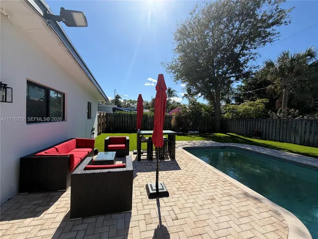 a view of outdoor space with seating area