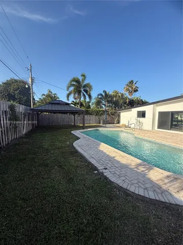 a view of a backyard with a garden