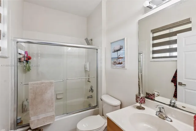 a living room with furniture fireplace and flat screen tv