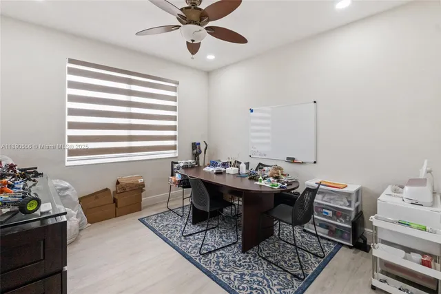 a bathroom with a sink vanity granite and a mirror
