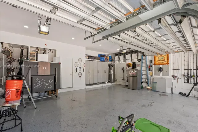 a front view of a building with a garden