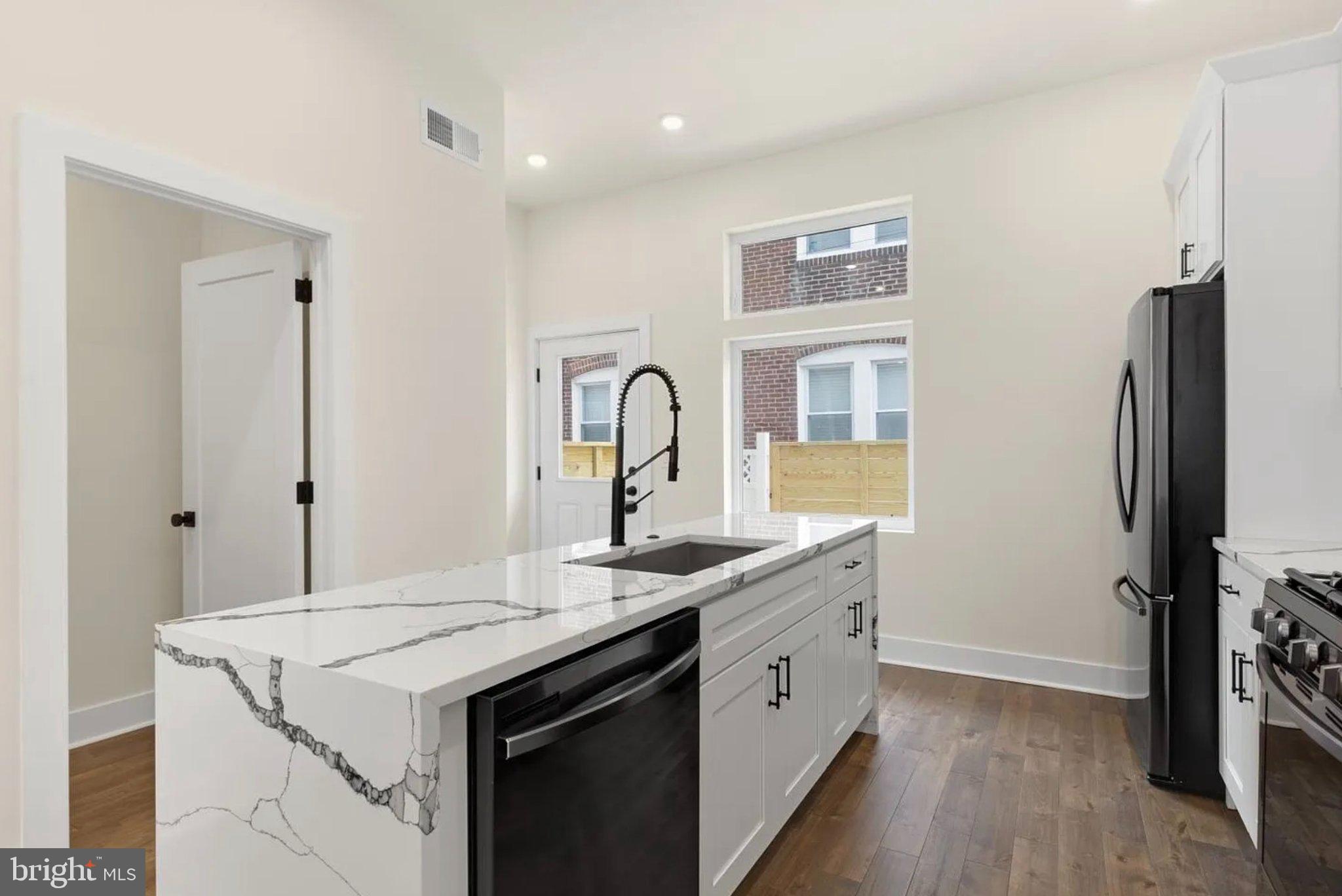 2719 Lefevre Street Philadelphia, PA 19137 - Photo 9 of 33 Sleek kitchen with modern elegance.