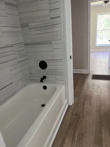 a bathroom with a bathtub