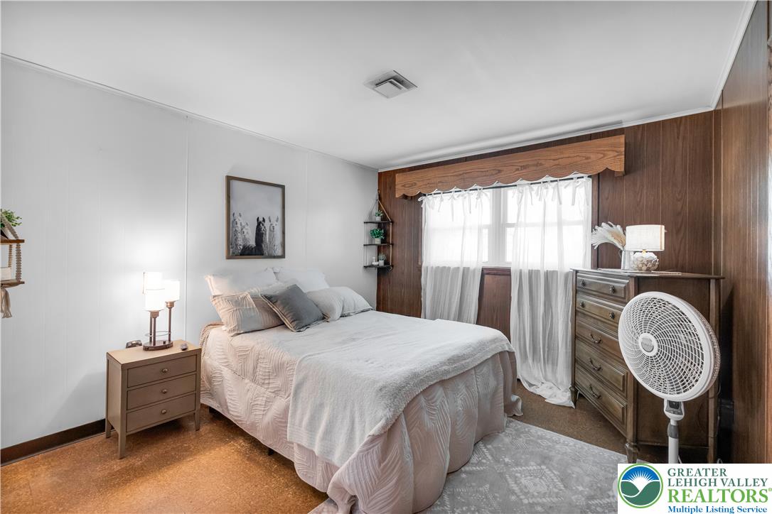 5747 Kernsville Road Orefield, PA 18069 - Photo 29 of 56 a bedroom with a bed and a window