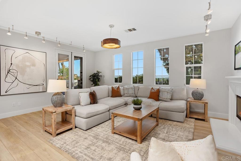 2386 Lapis Road Carlsbad, CA 92009 - Photo 13 of 65 a living room with furniture and a large window