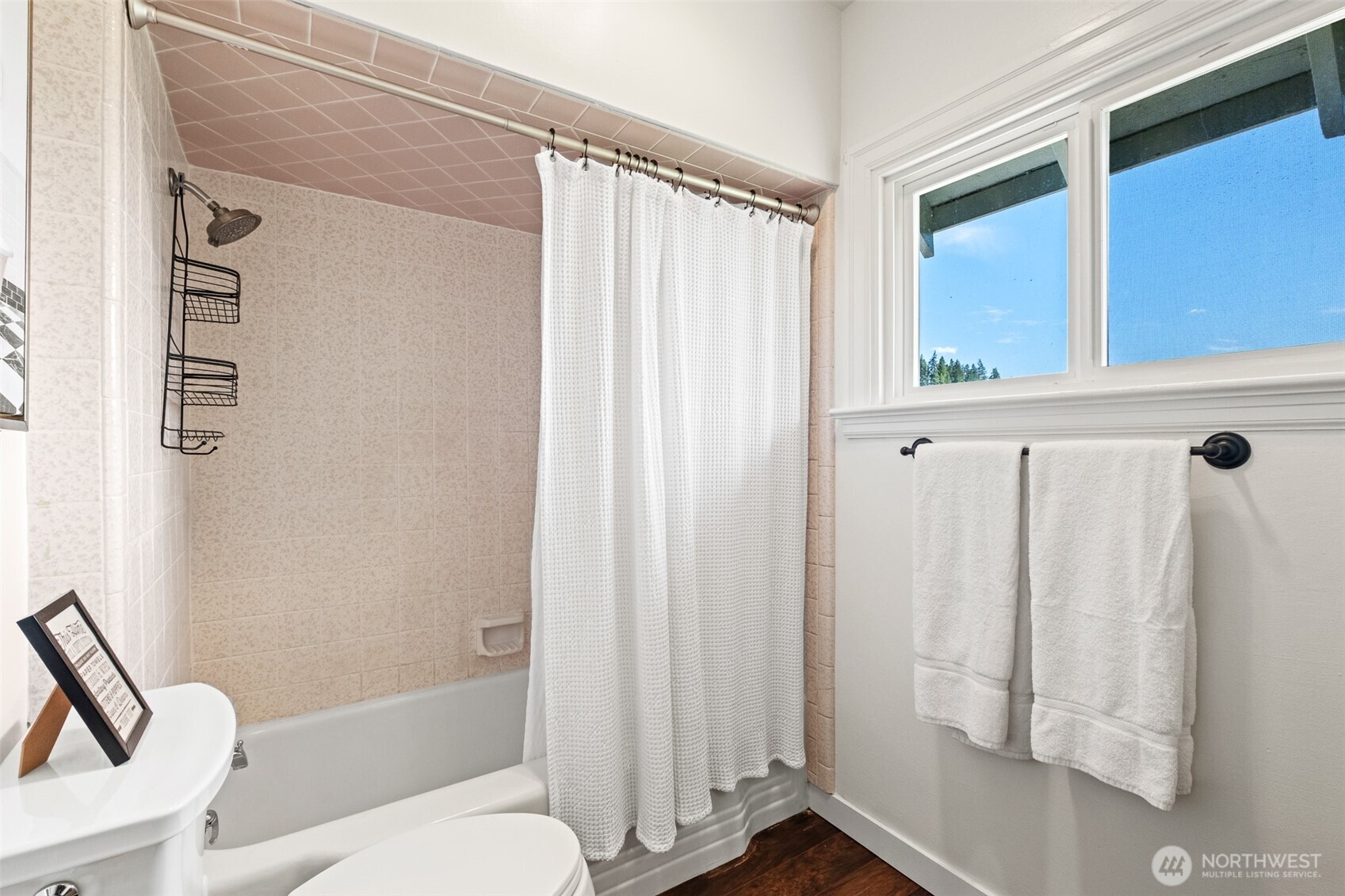 9753 Nibbelink Road Peshastin, WA 98847 - Photo 12 of 35 a bathroom with a shower curtain and a window