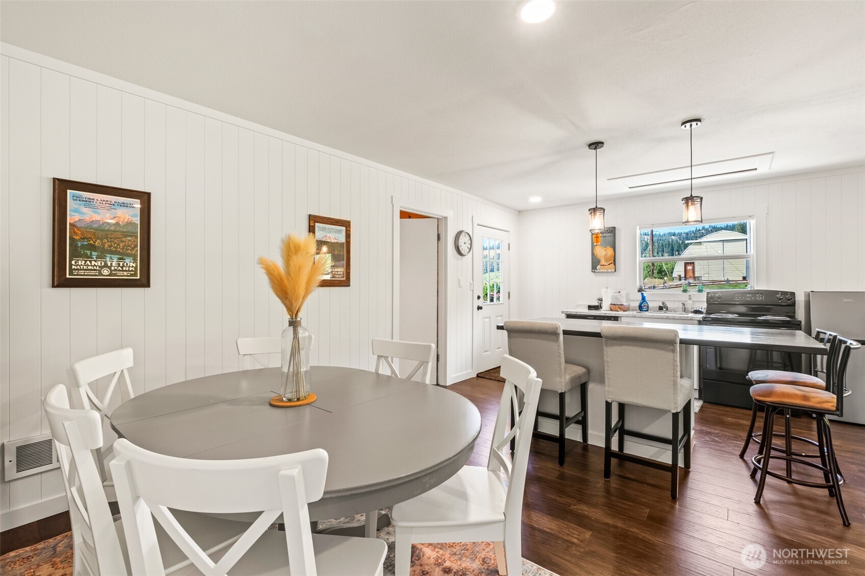 9753 Nibbelink Road Peshastin, WA 98847 - Photo 18 of 35 a view of a dining room with furniture and wooden floor