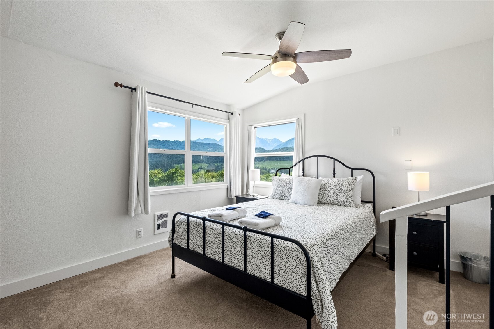 9753 Nibbelink Road Peshastin, WA 98847 - Photo 22 of 35 a bedroom with a bed next to a window