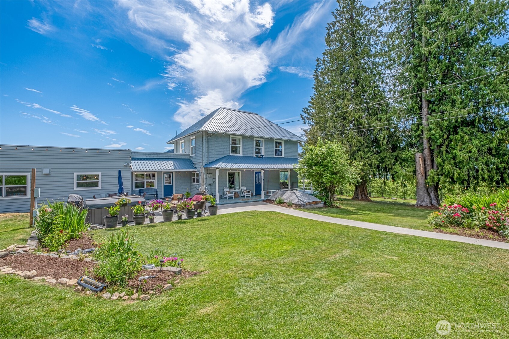 9753 Nibbelink Road Peshastin, WA 98847 - Photo 24 of 35 a view of a house with a big yard and potted plants