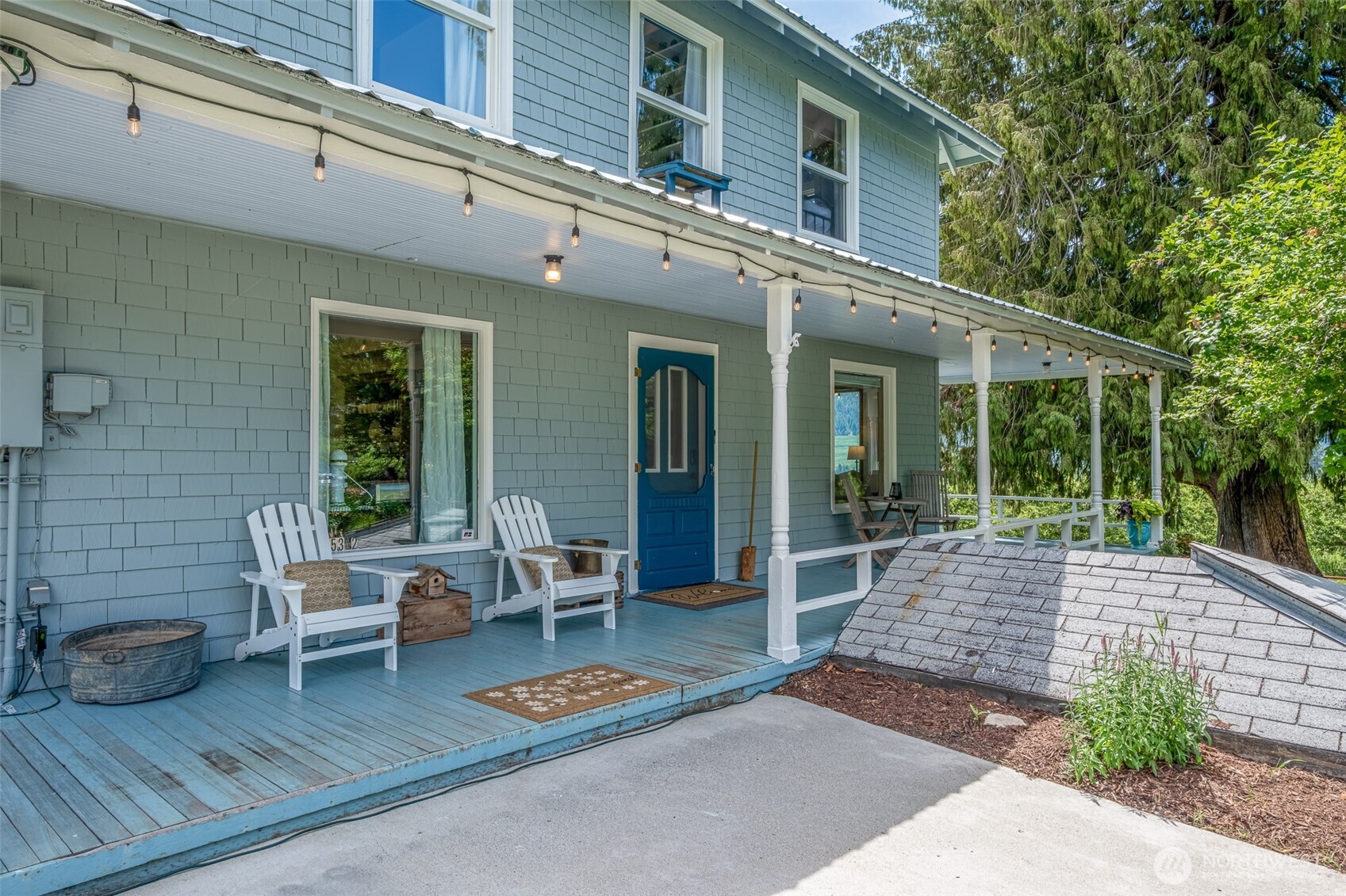 9753 Nibbelink Road Peshastin, WA 98847 - Photo 4 of 35 a view of a patio with table and chairs and wooden fence