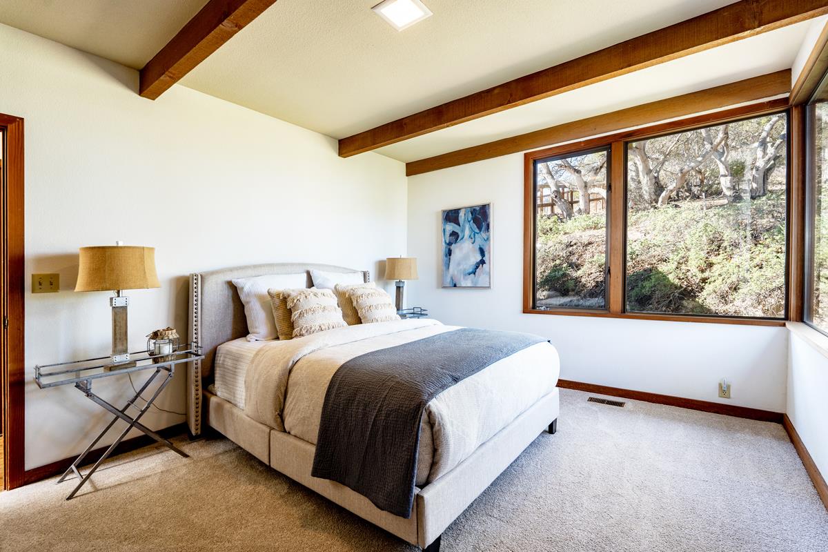 270 River Road Salinas, CA 93908 - Photo 32 of 44 a spacious bedroom with a bed and a large window