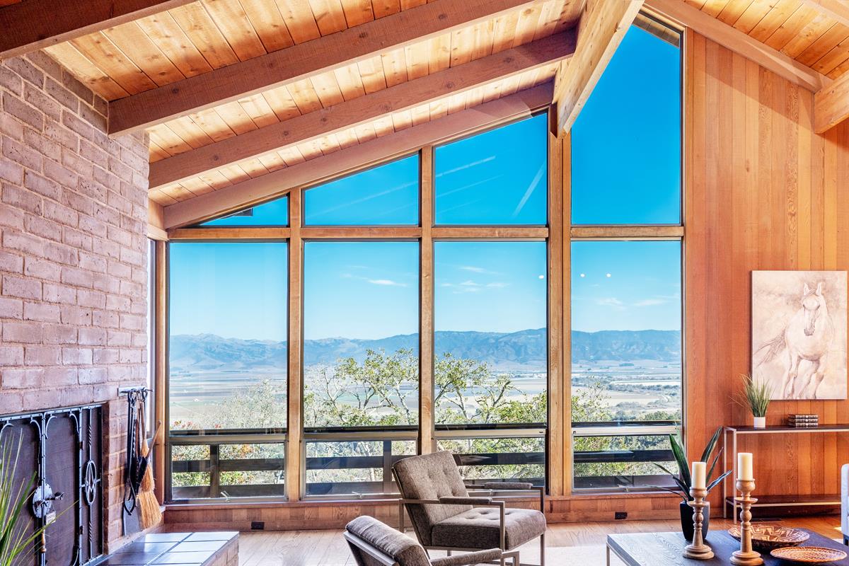 270 River Road Salinas, CA 93908 - Photo 4 of 44 a view of a balcony with chair and floor to ceiling window