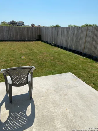 a view of outdoor space and yard