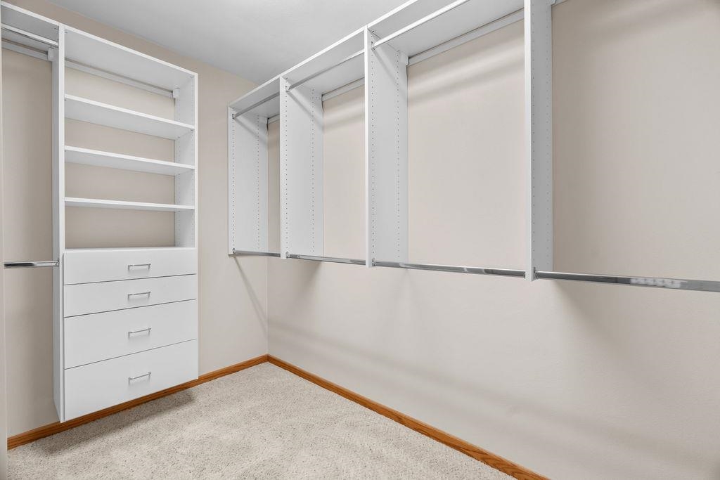 154 Rivers Edge Drive Cherry Valley, IL 61016 - Photo 19 of 32 a view of an empty walk in closet