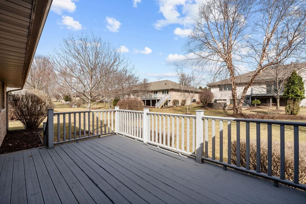 154 Rivers Edge Drive Cherry Valley, IL 61016 - Photo 25 of 32 a view of a balcony with wooden floor