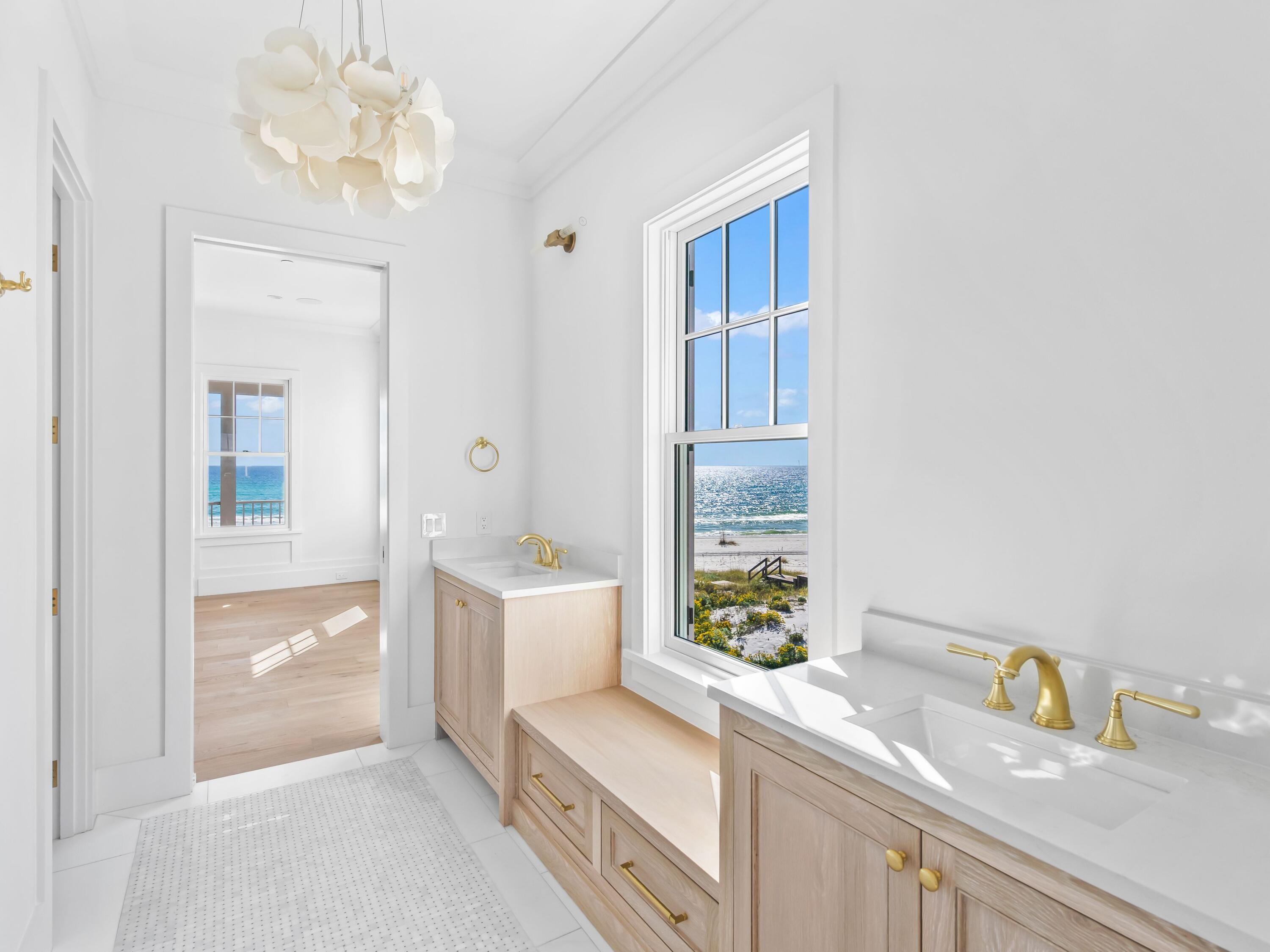 32 Lupin Bch Drive Inlet Beach, FL 32461 - Photo 14 of 24 a bathroom with a granite countertop sink and a mirror