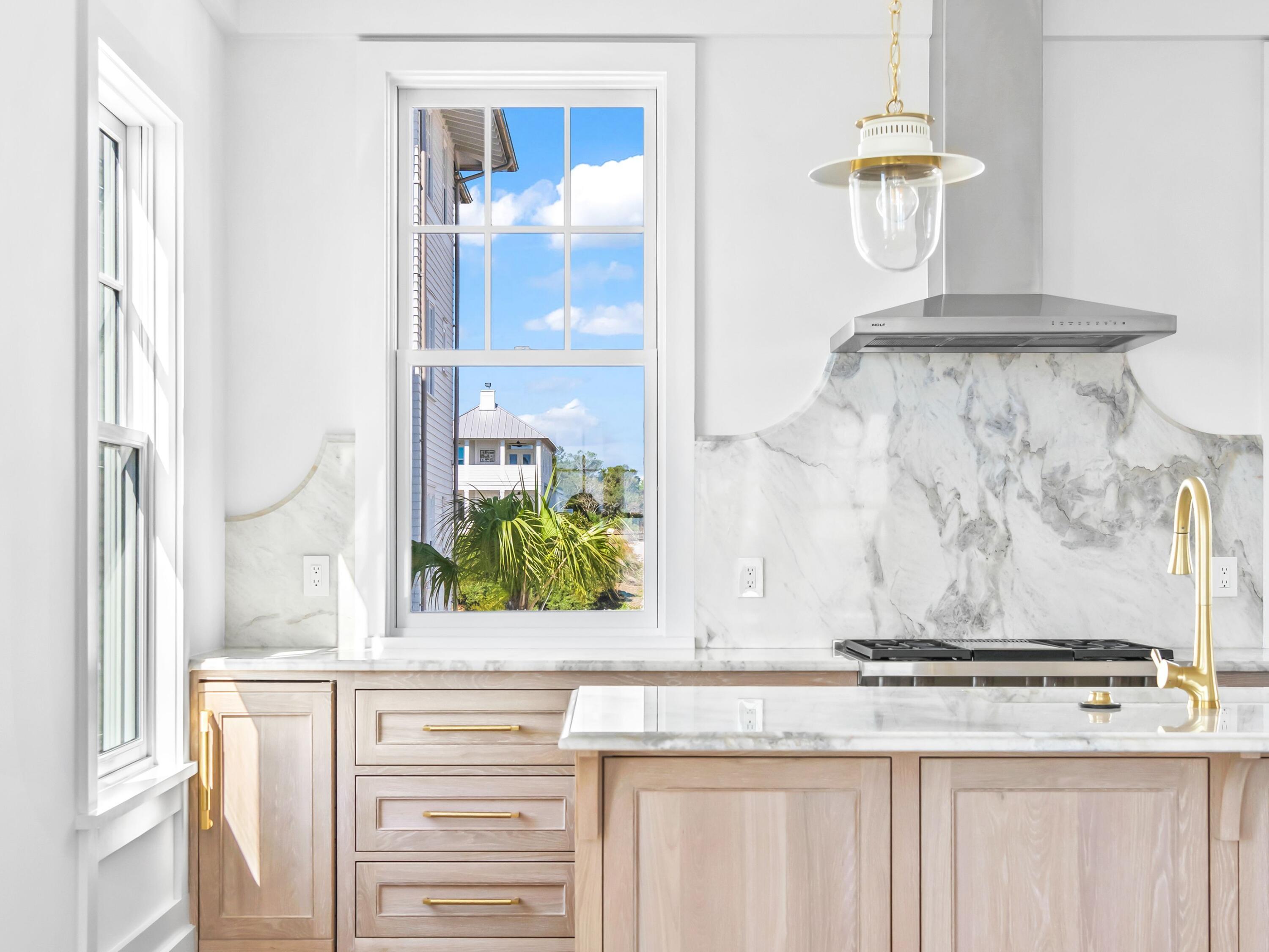 32 Lupin Bch Drive Inlet Beach, FL 32461 - Photo 6 of 24 a bathroom with a granite countertop sink and a window
