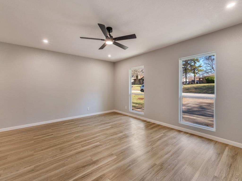 205 Laurel Street Mansfield, TX 76063 - Photo 15 of 24 an empty room with wooden floor closet and windows