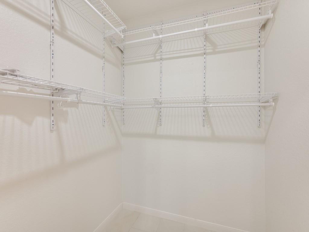 205 Laurel Street Mansfield, TX 76063 - Photo 17 of 24 a view of a room with racks on the wall