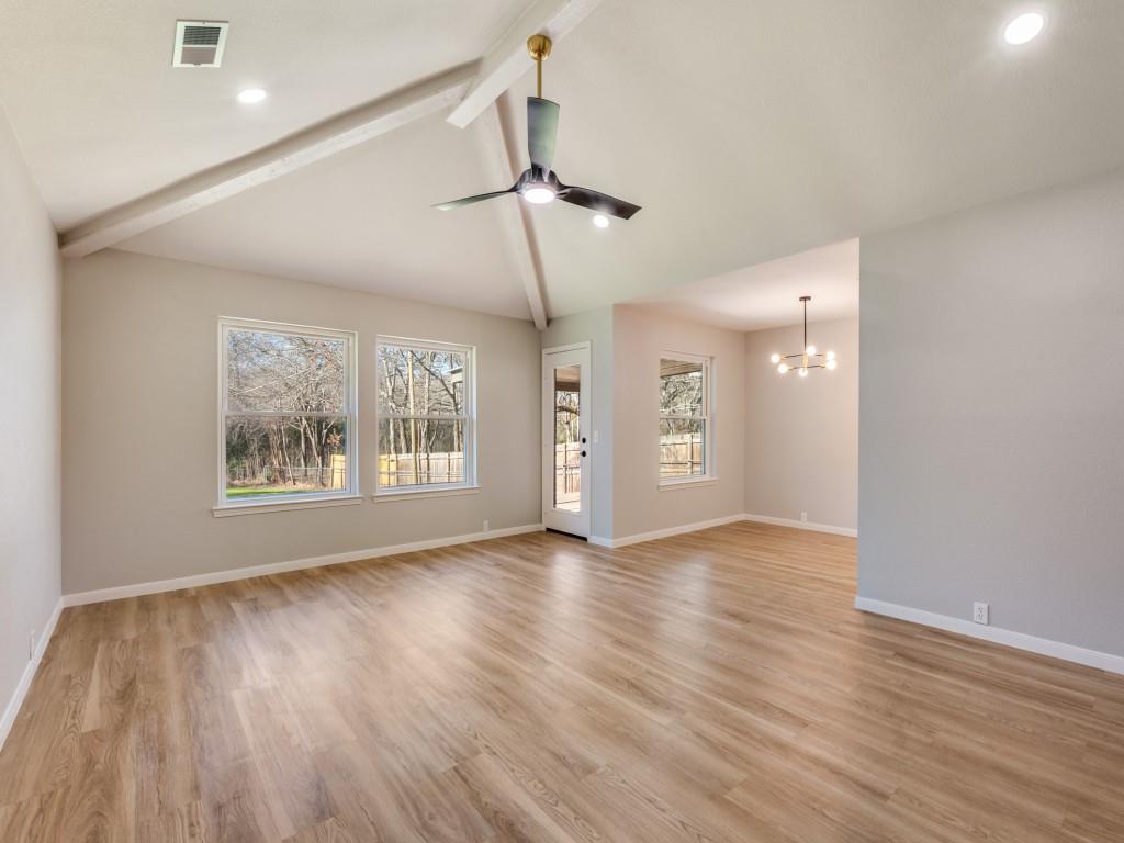 205 Laurel Street Mansfield, TX 76063 - Photo 6 of 24 a view of an empty room with wooden floor and a window