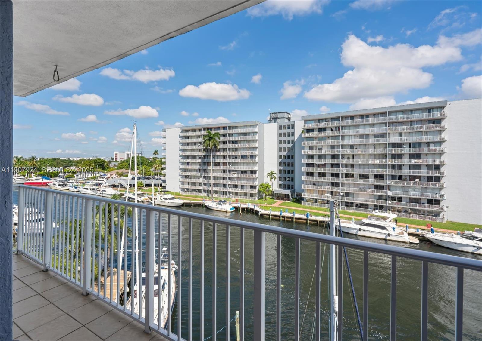 2475 Northwest 16th St Road, Unit 616 Miami, FL 33125 - Photo 12 of 32 a view of a balcony with city view