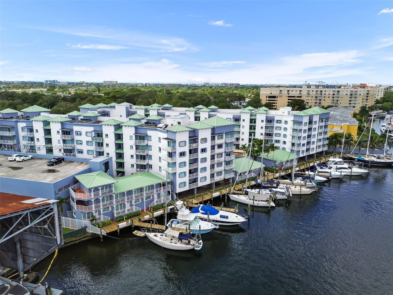 2475 Northwest 16th St Road, Unit 616 Miami, FL 33125 - Photo 2 of 32 a view of a city with tall buildings