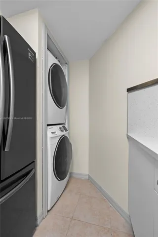 a close view of a utility room with washer and dryer