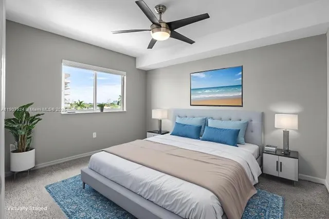 a bedroom with a bed and a potted plant
