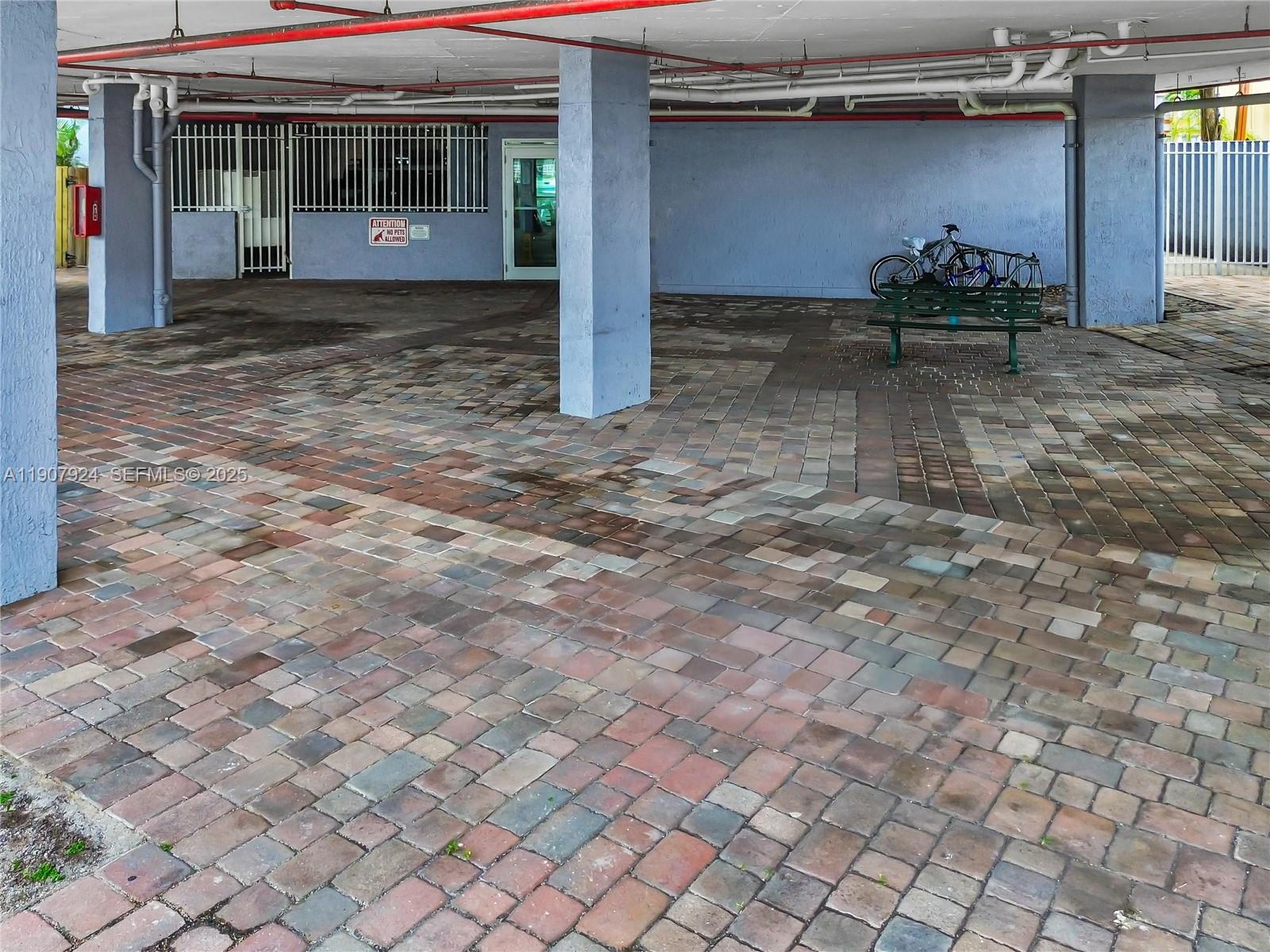 2475 Northwest 16th St Road, Unit 616 Miami, FL 33125 - Photo 30 of 32 a view of a porch yard